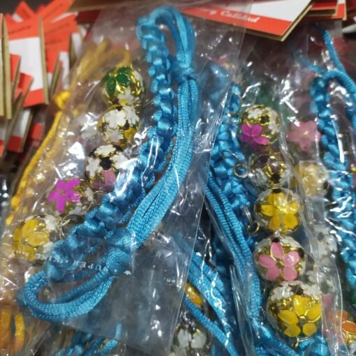 COLLAR HILO TRENZADO X / 5 CASCABELES